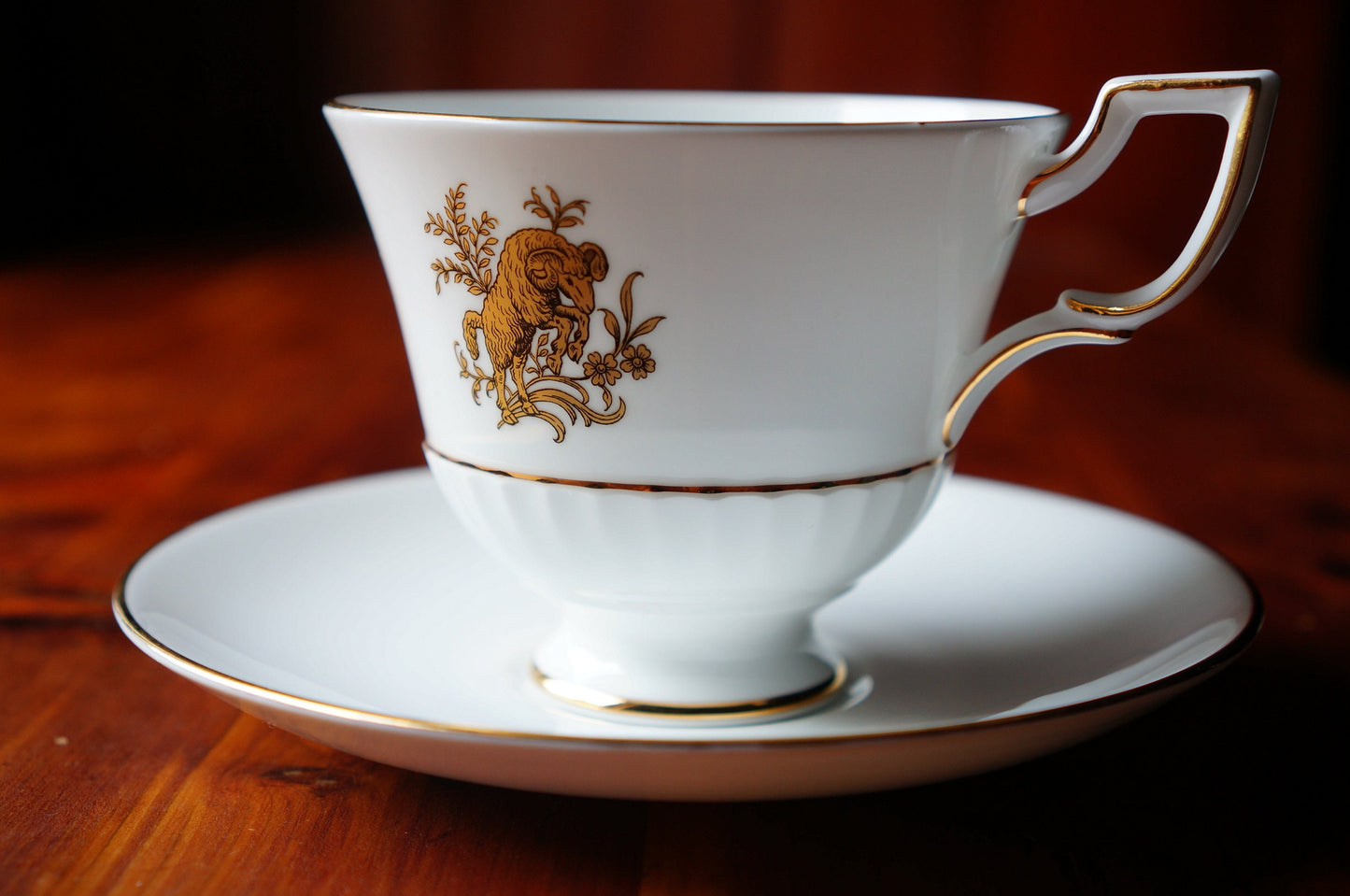 Royal Tuscan Aries pattern teacup and saucer, made in England. fine bone china