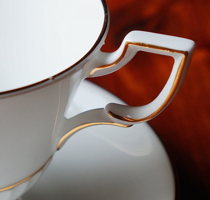 Royal Tuscan Aries pattern teacup and saucer, made in England. fine bone china