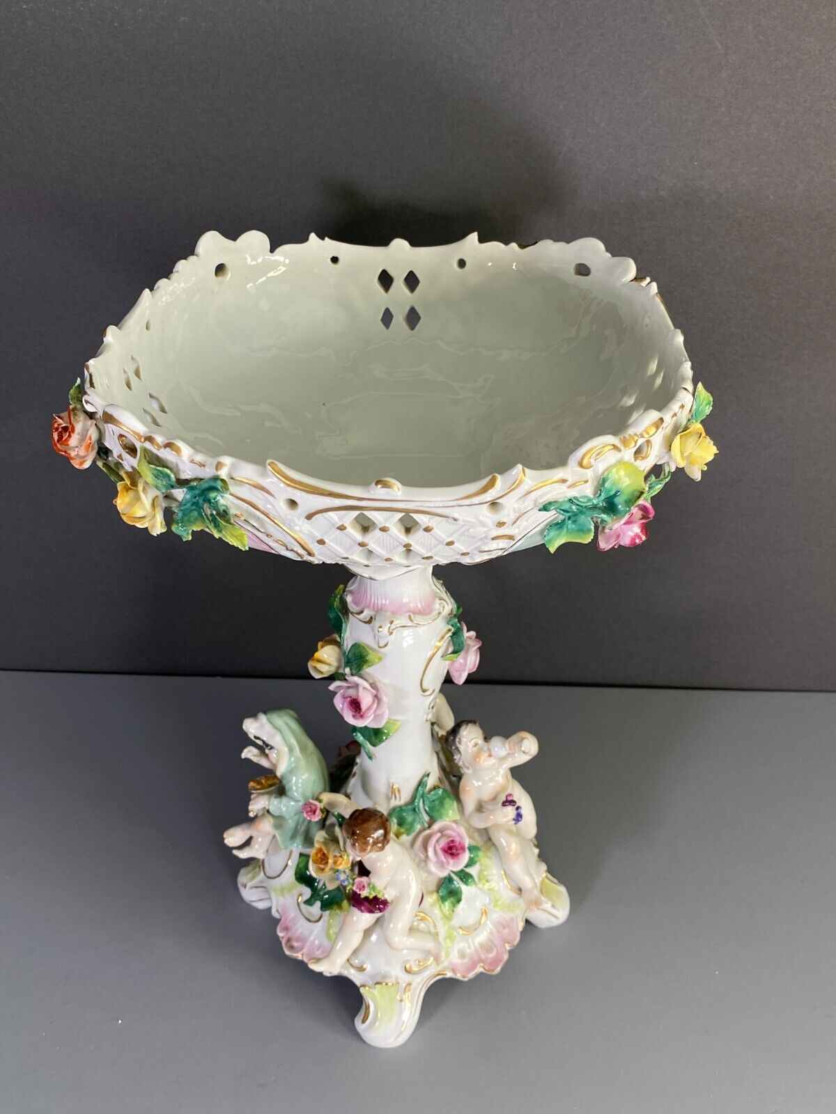 C.1915Germany Volkstedt Dresden porcelain floral encrusted Figural centerpiece.