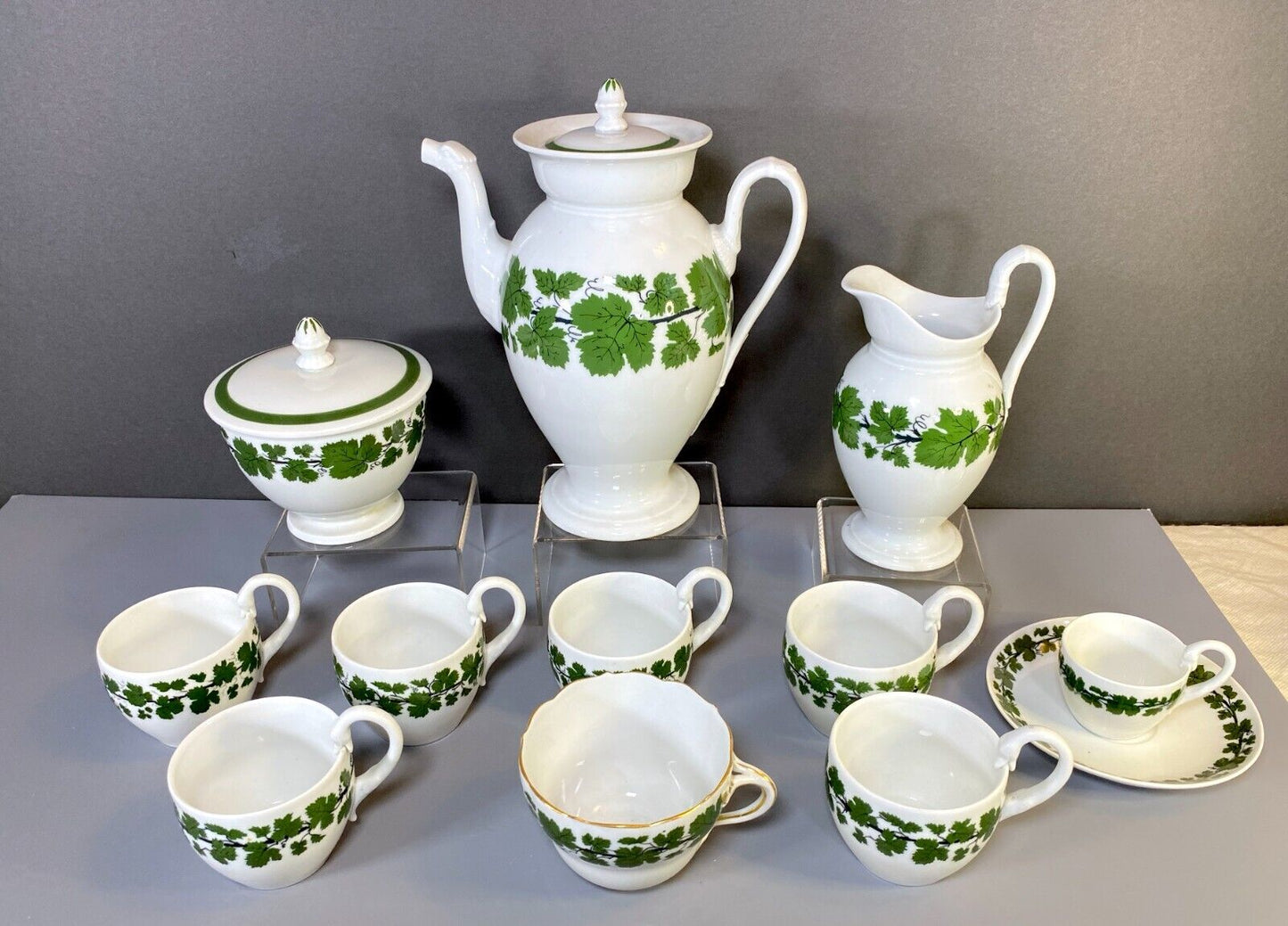 Meissen coffee service, green vine, w/snake/dragon shape handles and spout, 19C.