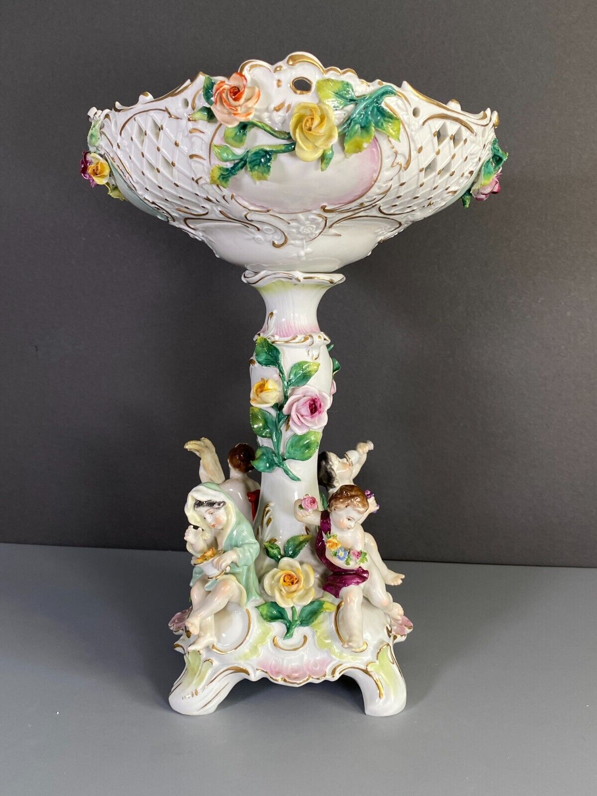 C.1915Germany Volkstedt Dresden porcelain floral encrusted Figural centerpiece.