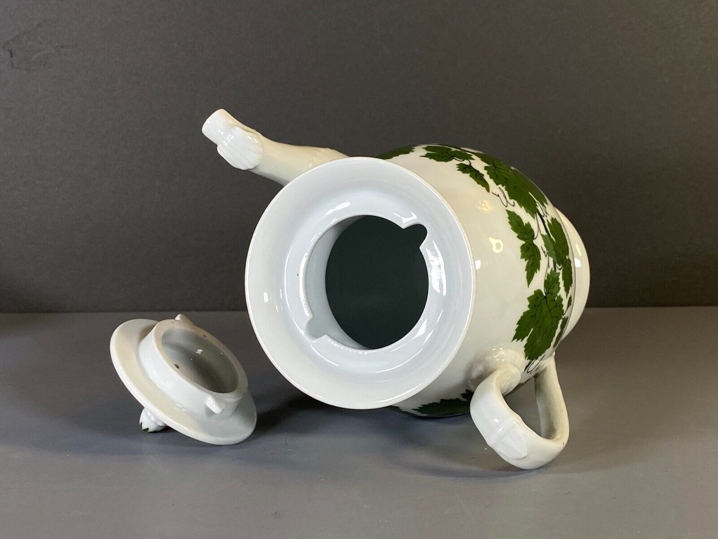 Meissen coffee service, green vine, w/snake/dragon shape handles and spout, 19C.