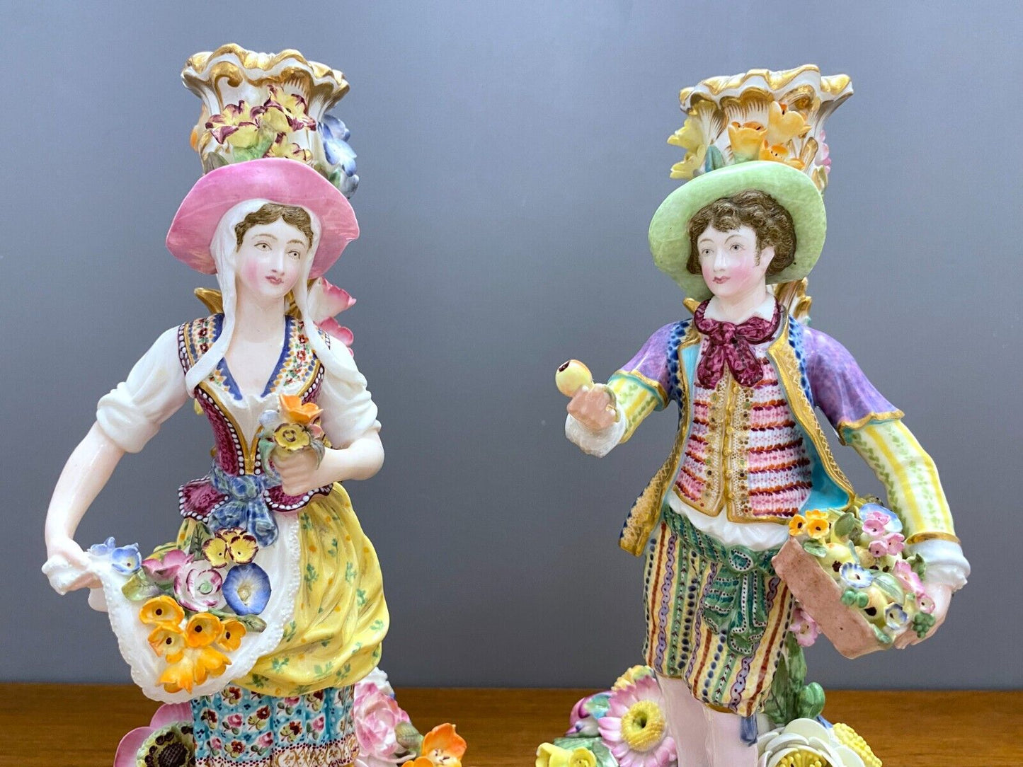 Pair Derby/Chelsea porcelain Figural candlestick, man and woman,18 century, rare