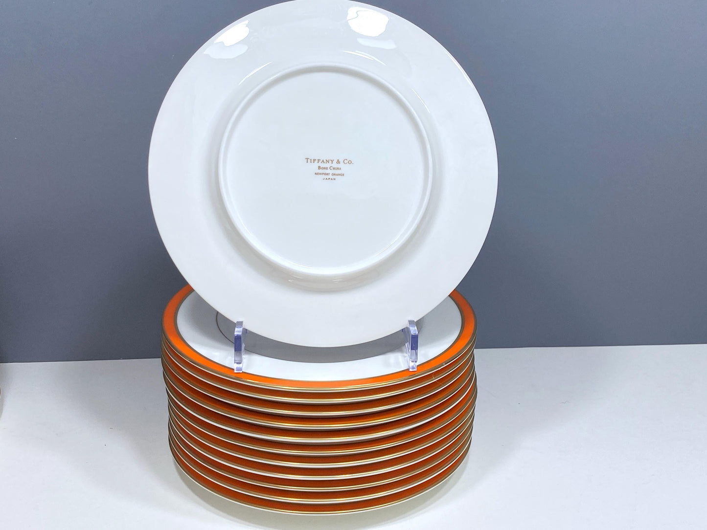 Stunning TIFFANY & CO. "Newport Orange" dinnerware for 12, gold rim, 51 pieces, Mint condition!