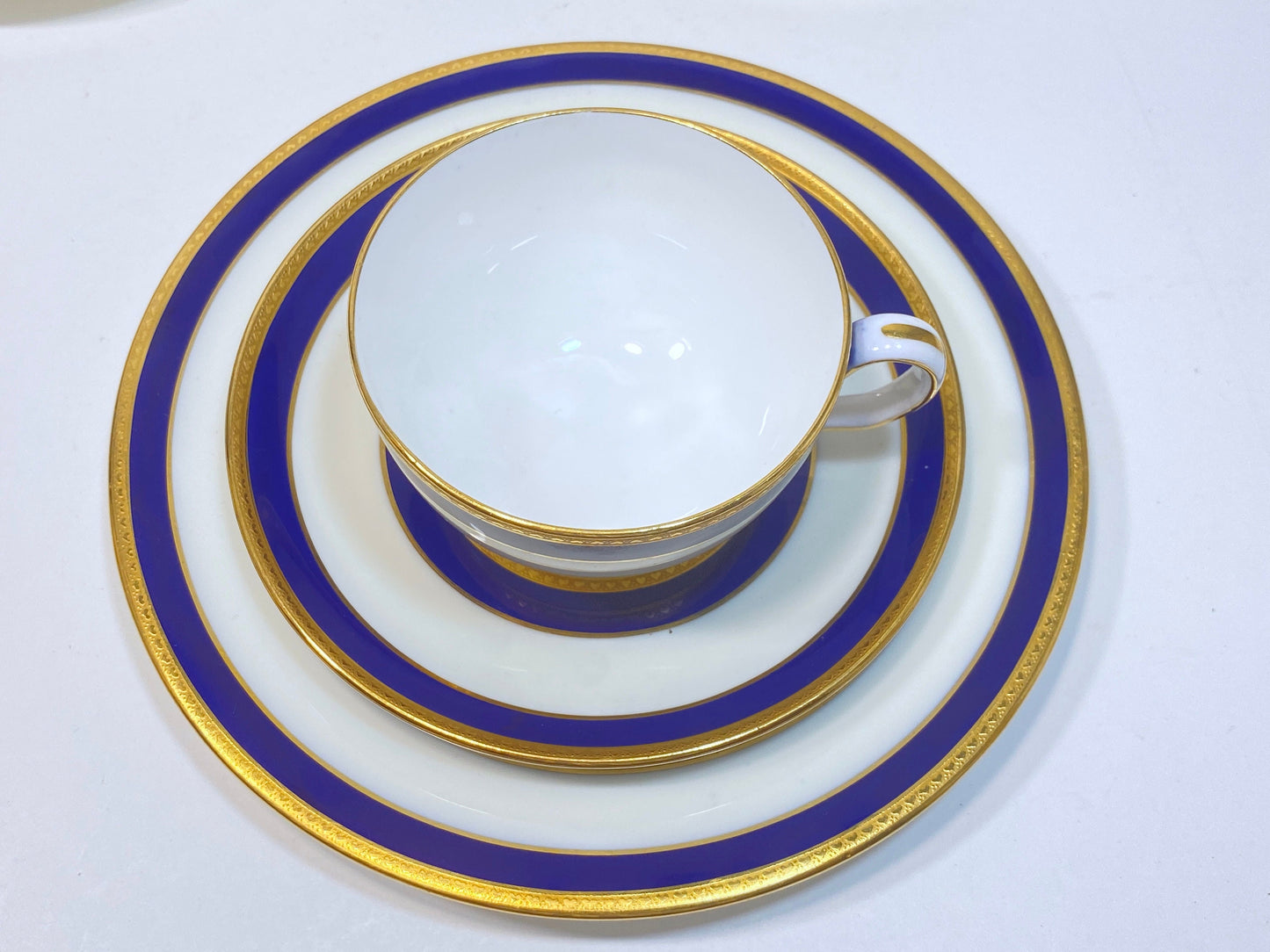 Set of 12 (35pcs) Tiffany & Co Mintons bone china teacups and plats, blue band and gold decoration, ca. 1900, stunning