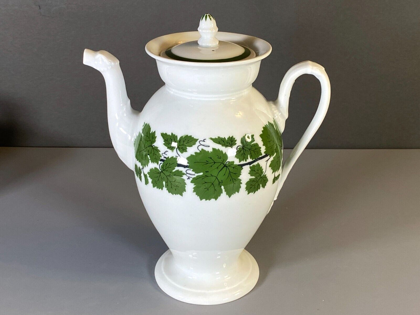 Meissen coffee service, green vine, w/snake/dragon shape handles and spout, 19C.