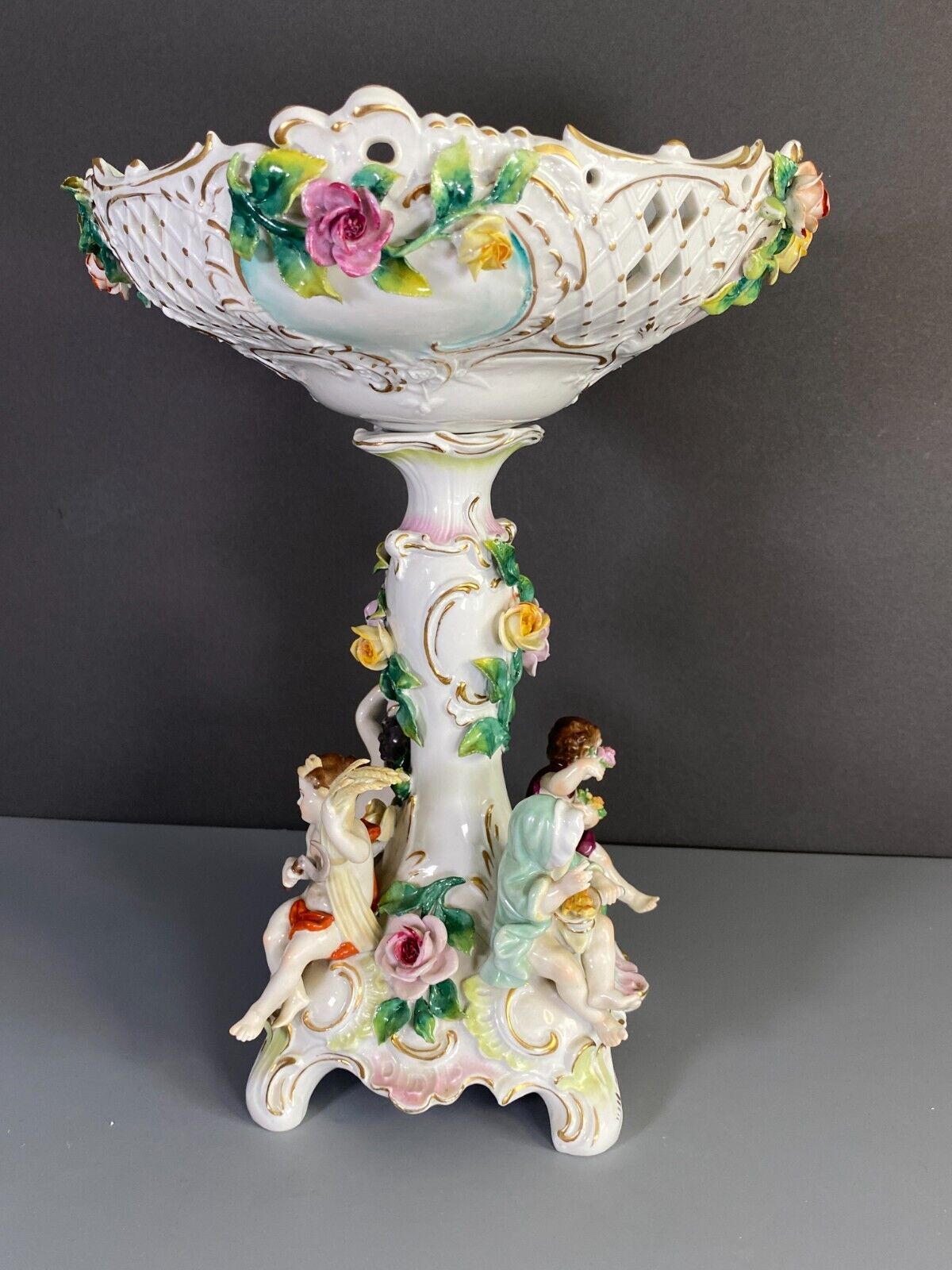 C.1915Germany Volkstedt Dresden porcelain floral encrusted Figural centerpiece.