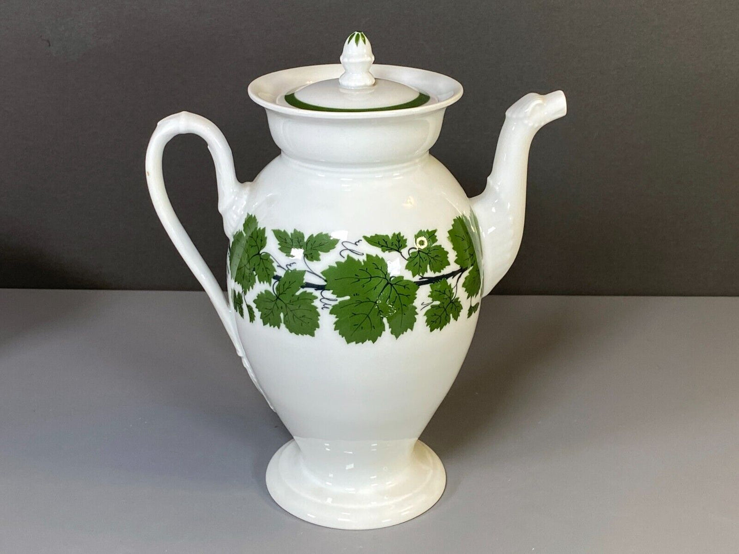 Meissen coffee service, green vine, w/snake/dragon shape handles and spout, 19C.