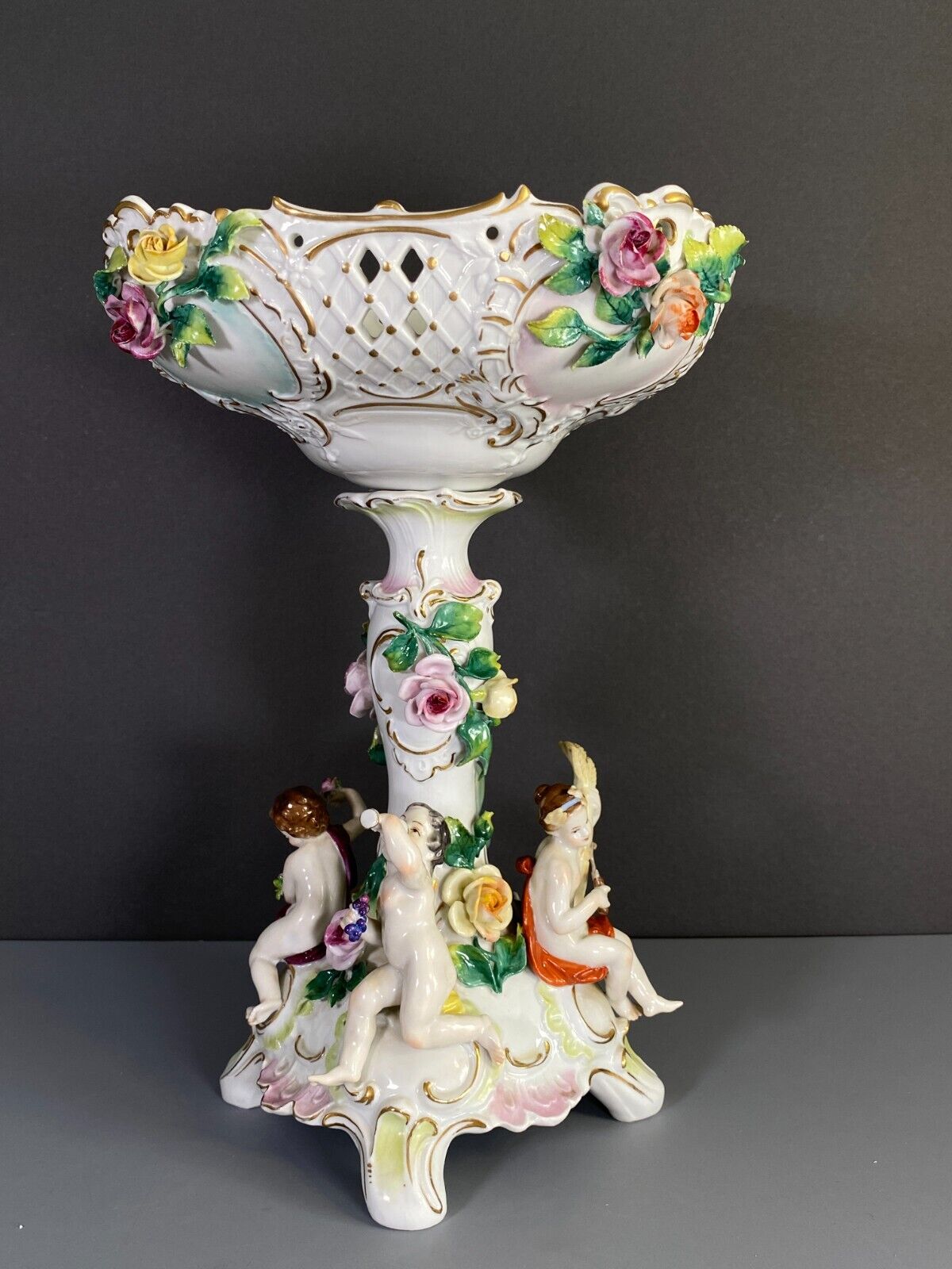 C.1915Germany Volkstedt Dresden porcelain floral encrusted Figural centerpiece.