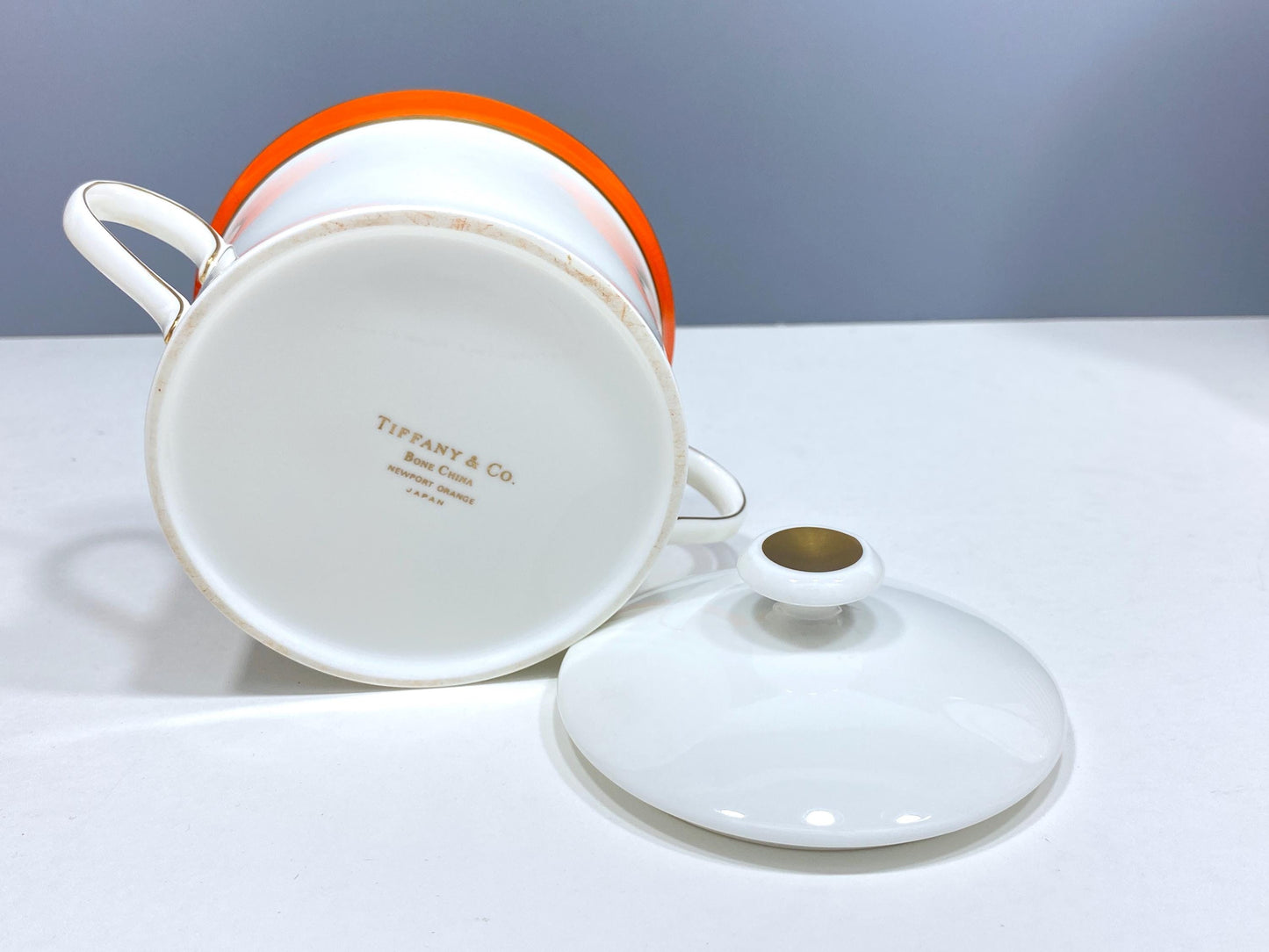 Stunning TIFFANY & CO. "Newport Orange" dinnerware for 12, gold rim, 51 pieces, Mint condition!