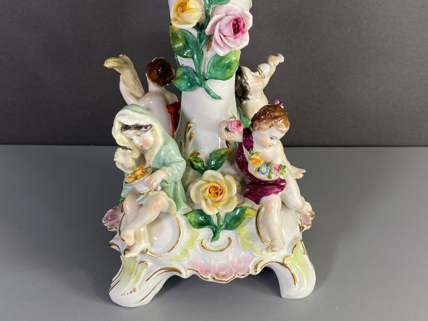 C.1915Germany Volkstedt Dresden porcelain floral encrusted Figural centerpiece.