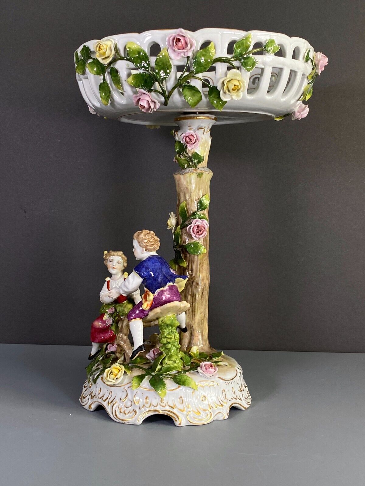 Germany Von Schierholz porcelain figural centerpiece w/ encrusted flower motif