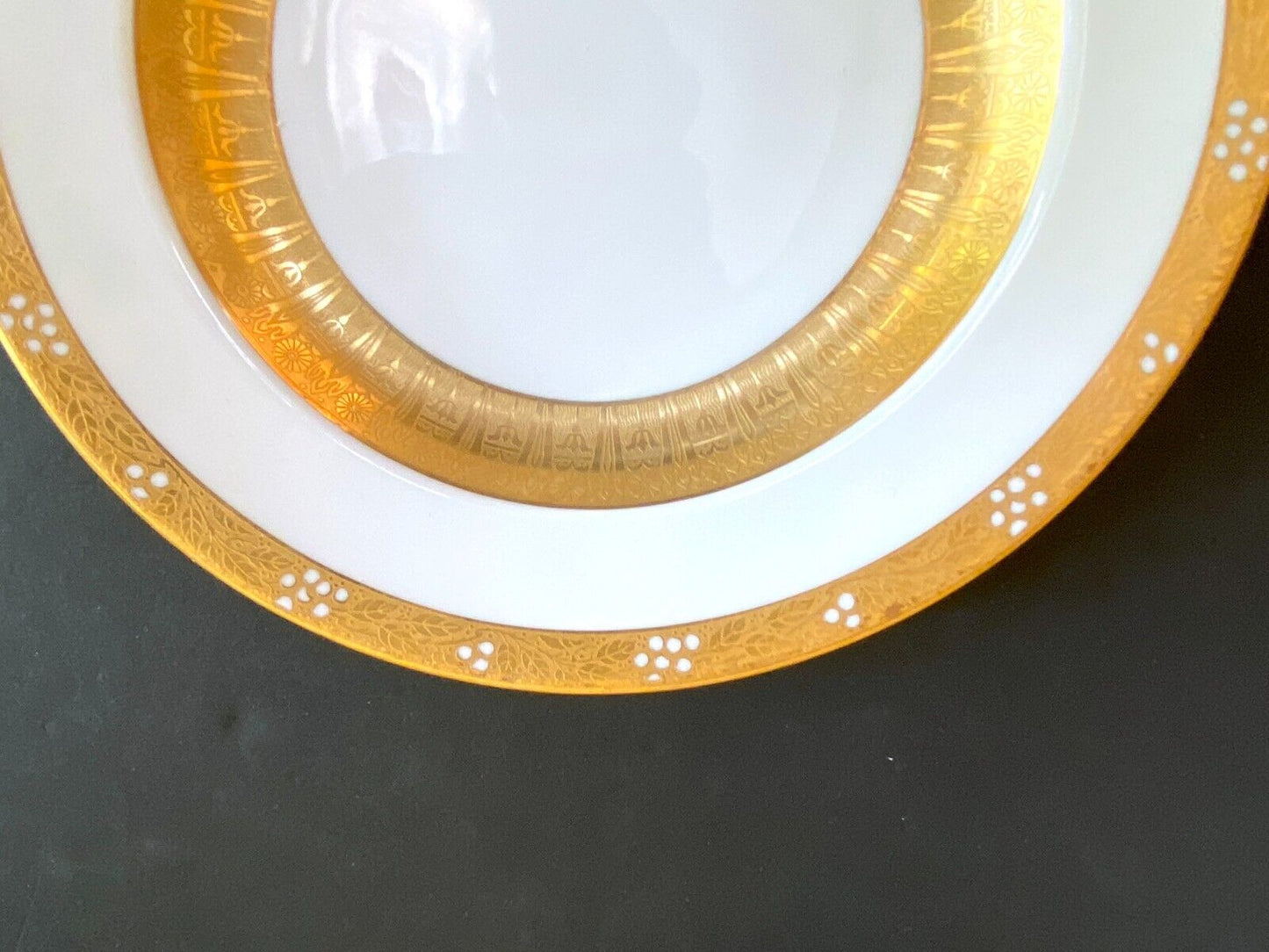 Set of 7 Lenox for Tiffany & Co. rimmed bowl, heavy gold encrusted, 9'', ca.1910