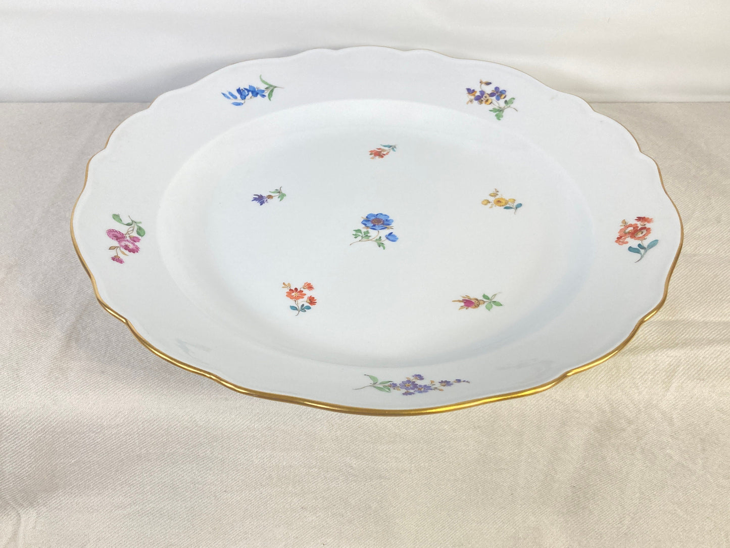 large Meissen oval platter decorated with scattered flowers and gilt rim, 16.5 inches x 12 inches, 1950s