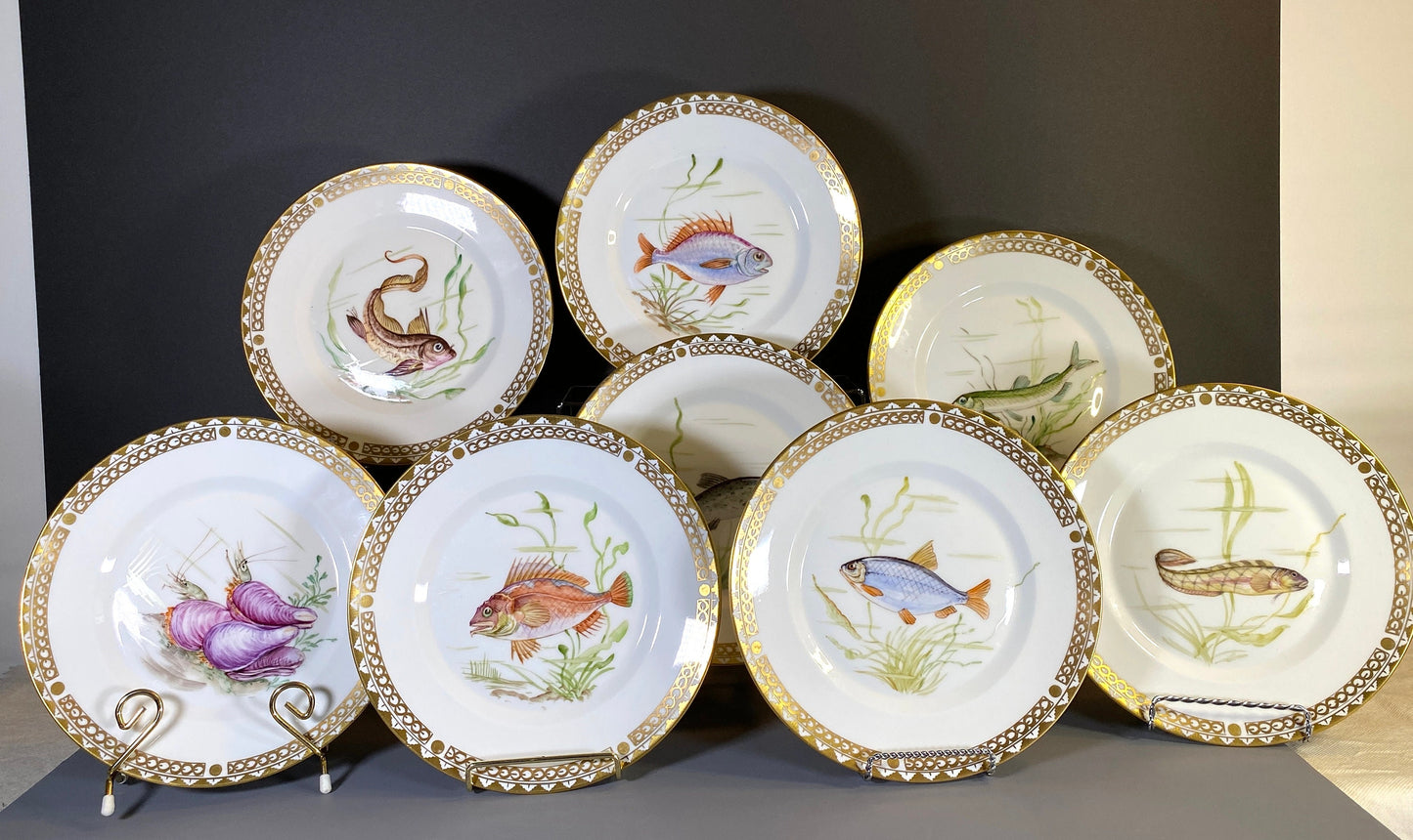 Set of 8 Royal Copenhagen hand-painted fish plates, gilt rim, ca. 1947, very rare! excellent condition, highly collectible