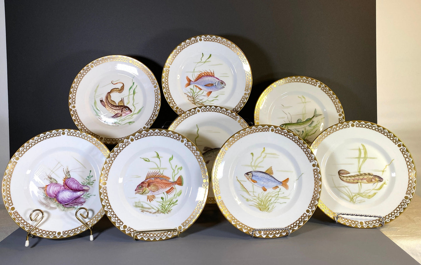 Set of 8 Royal Copenhagen hand-painted fish plates, gilt rim, ca. 1947, very rare! excellent condition, highly collectible