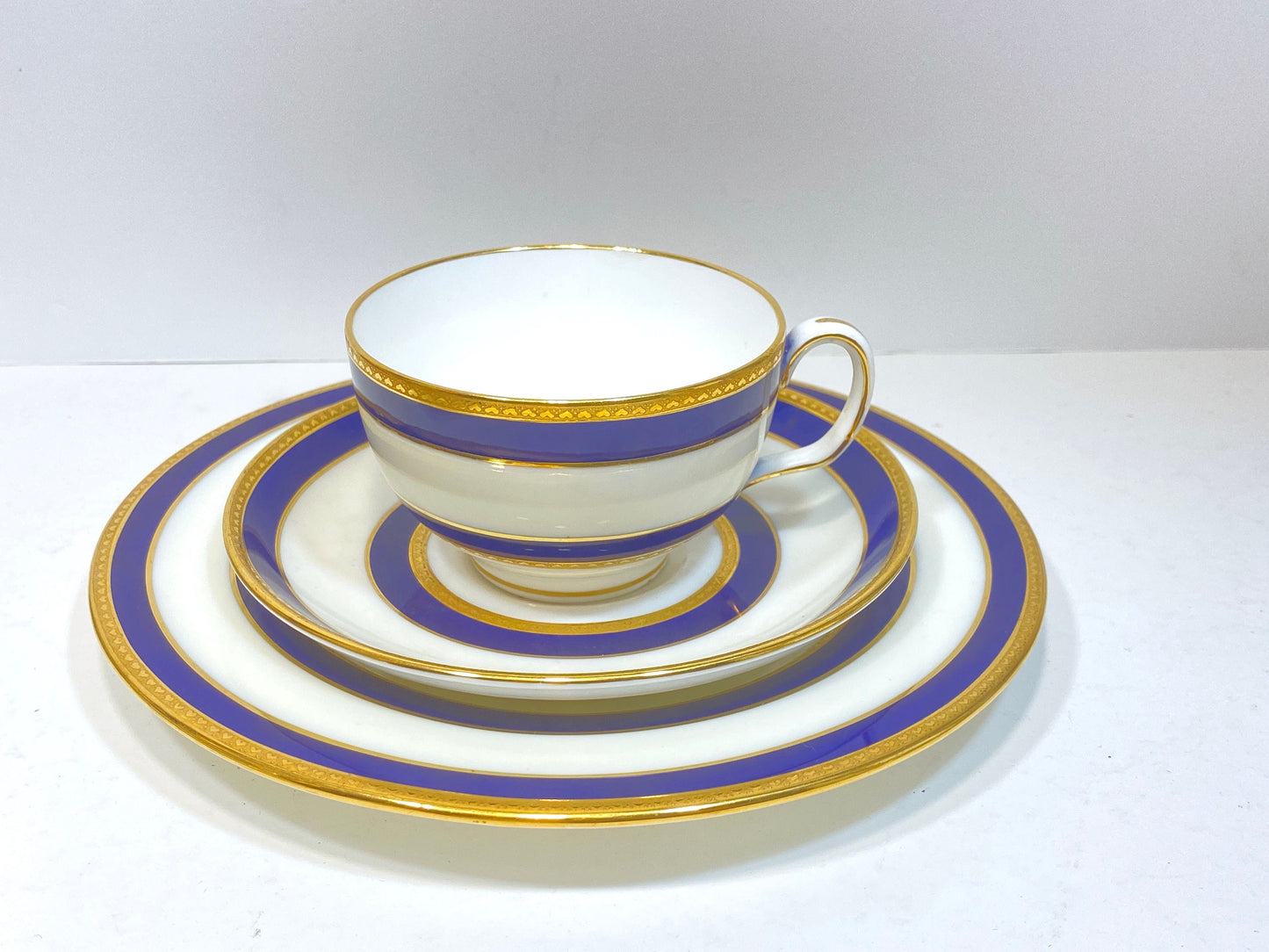 Set of 12 (35pcs) Tiffany & Co Mintons bone china teacups and plats, blue band and gold decoration, ca. 1900, stunning