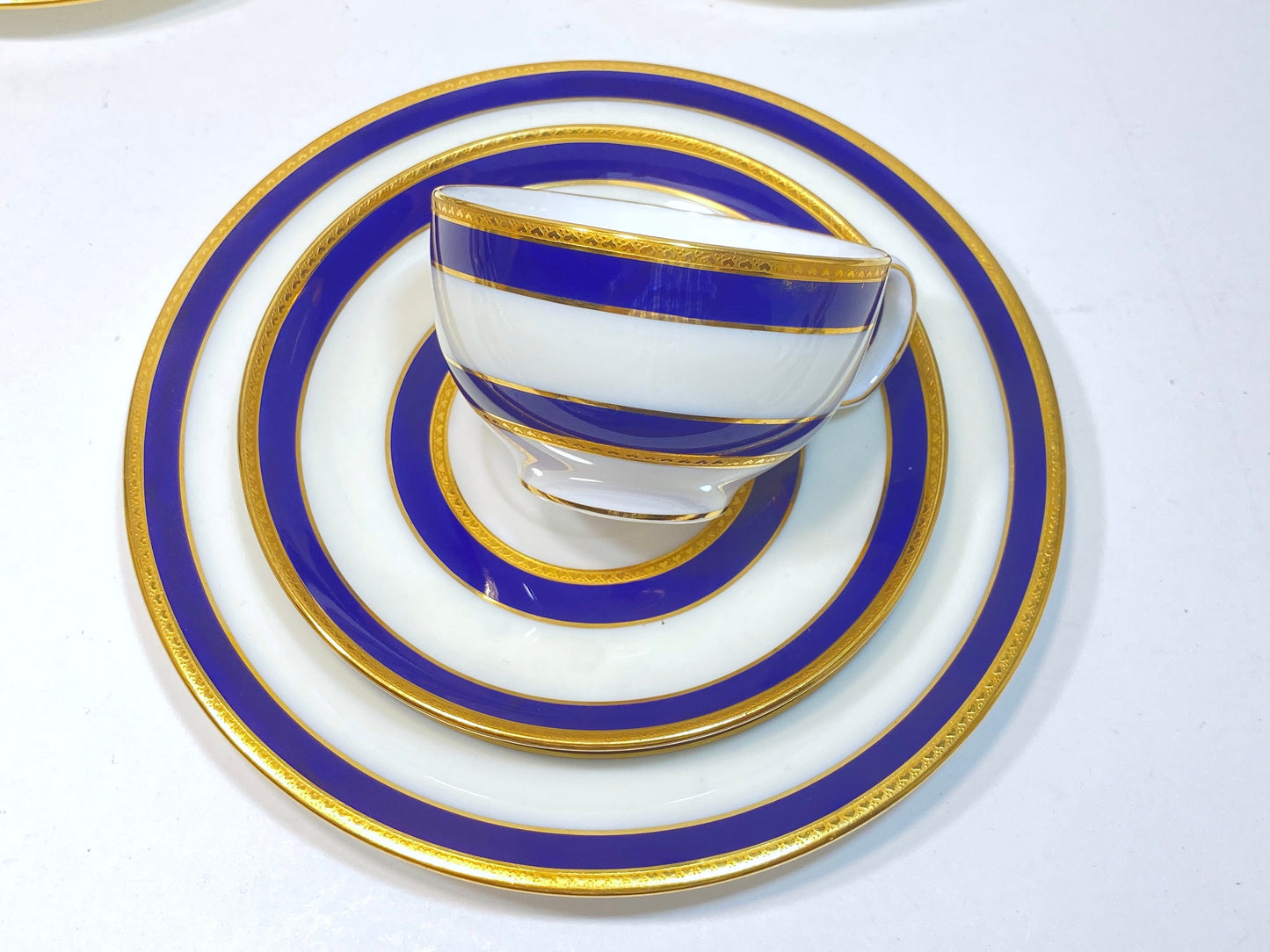 Set of 12 (35pcs) Tiffany & Co Mintons bone china teacups and plats, blue band and gold decoration, ca. 1900, stunning