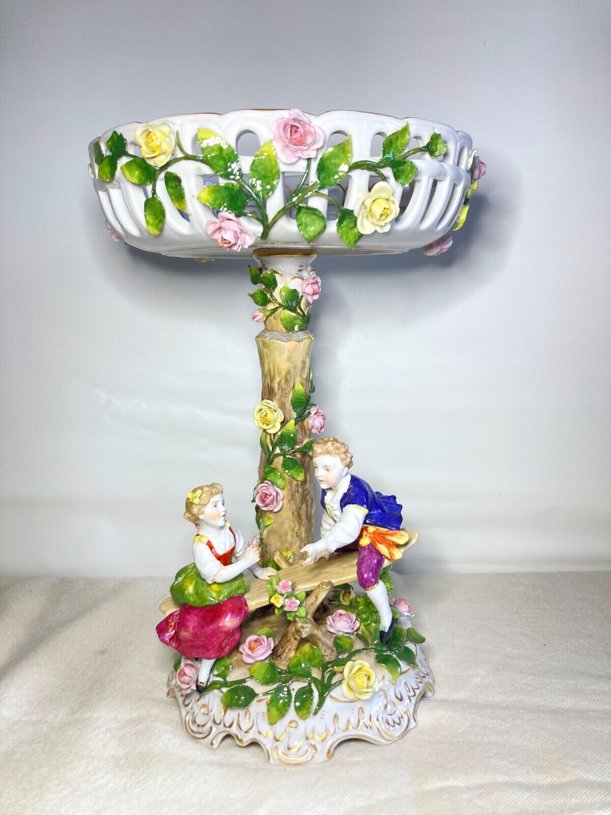 Germany Von Schierholz porcelain figural centerpiece w/ encrusted flower motif