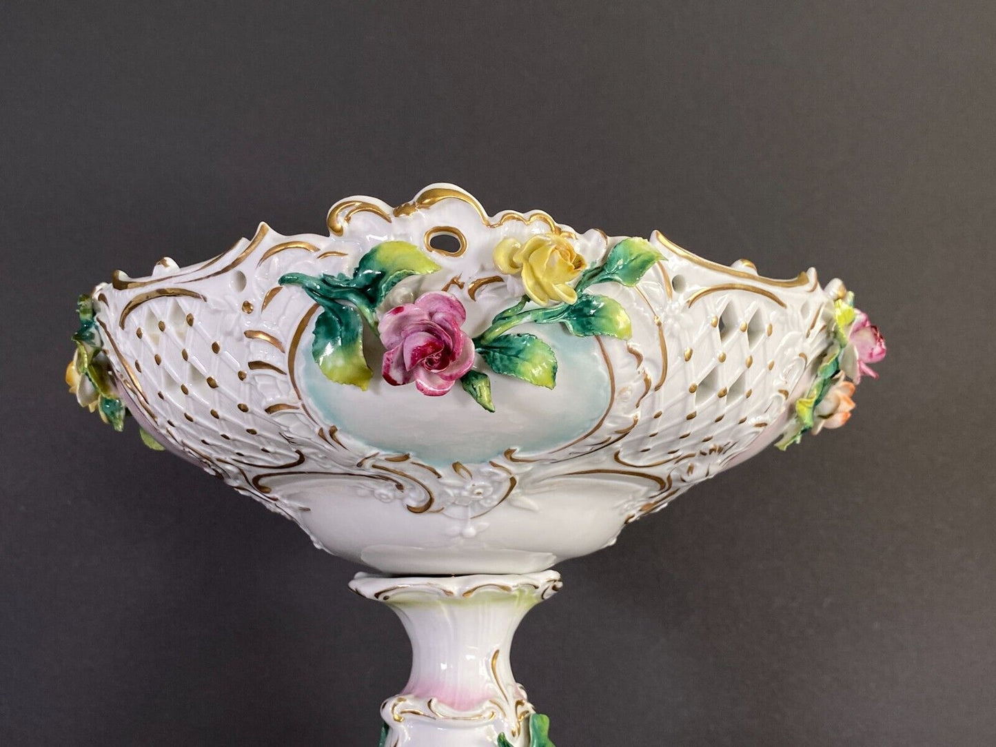 C.1915Germany Volkstedt Dresden porcelain floral encrusted Figural centerpiece.