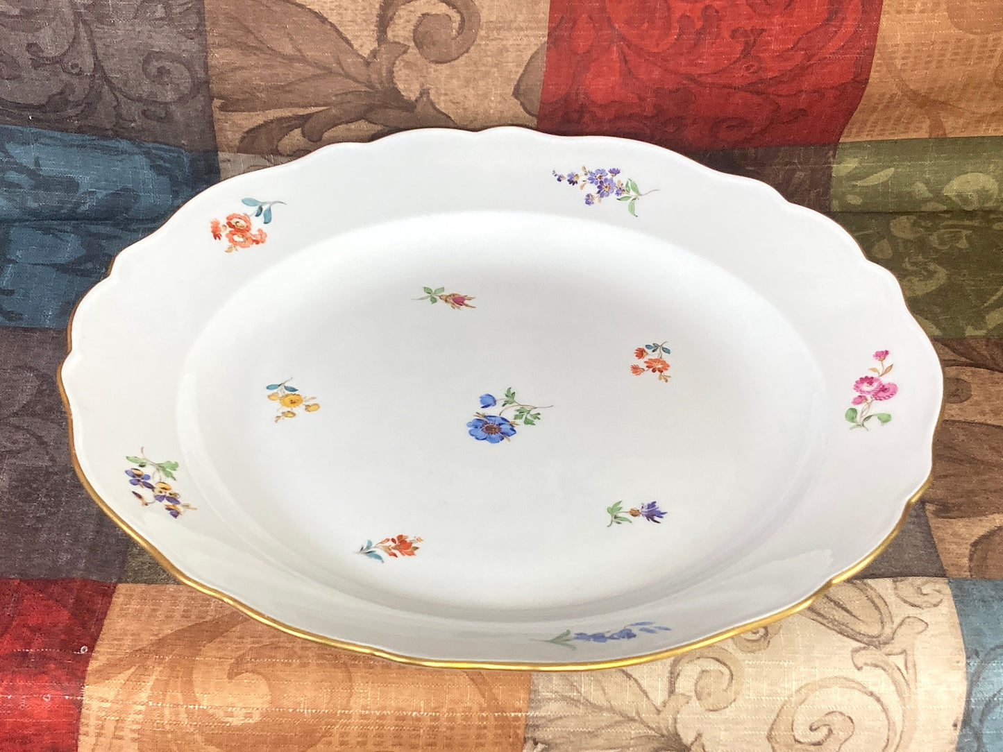 large Meissen oval platter decorated with scattered flowers and gilt rim, 16.5 inches x 12 inches, 1950s